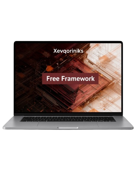 A silver laptop shown open against a plain white background, with a dark abstract screen displaying the text 'Xevqoriniks' and 'Free Framework'.